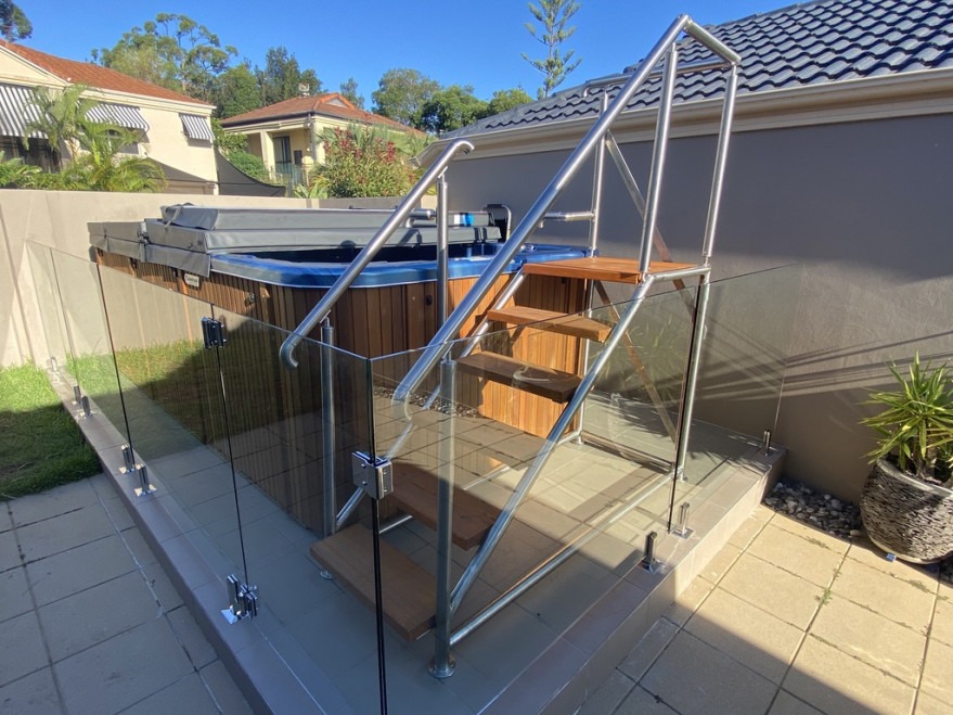 Swim spa with glass gate